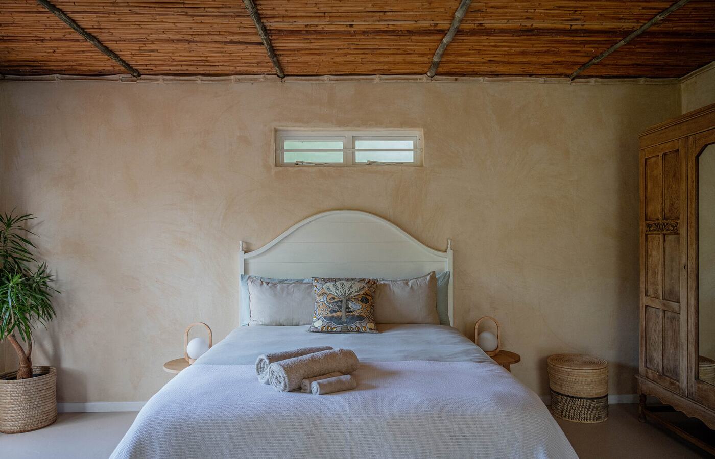 The bedroom under the bamboo ceiling